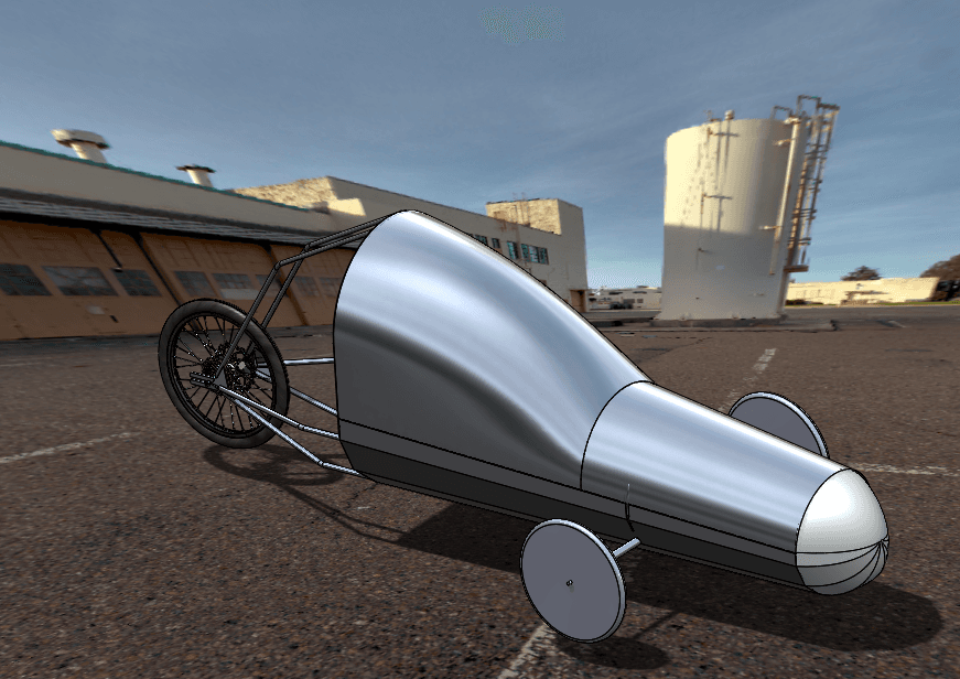CAD render of a three-wheeled teardrop-shaped vehicle with a silver body and an exposed tubular rear frame holding a single spoked wheel, composited onto a parking lot.